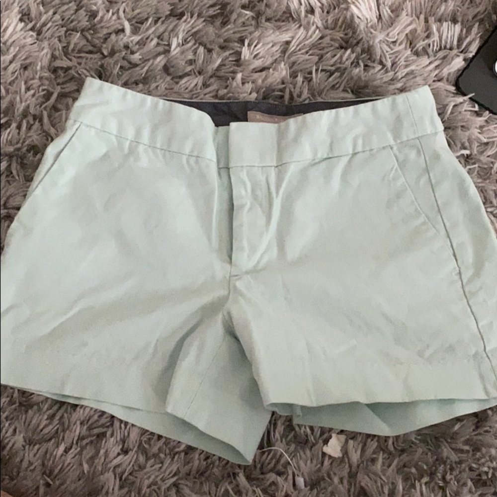 Light green/teal shorts